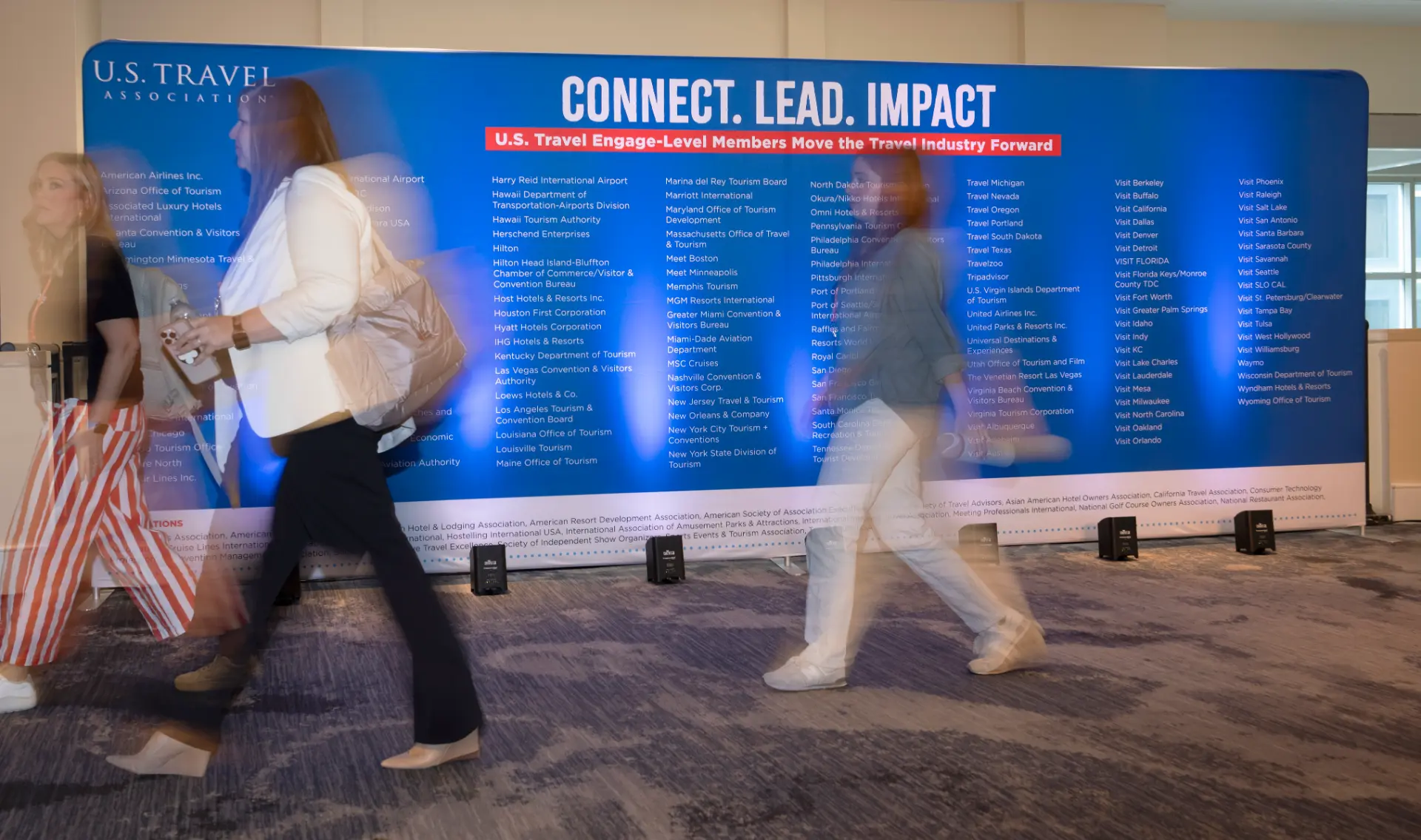 U.S. Travel Connect. Lead. Impact. member wall at ESTO 2026